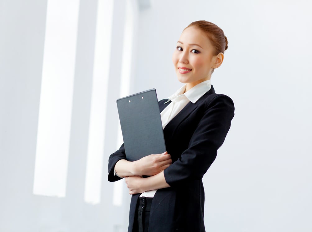 Attractive Asian Businesswoman in Formal Suit